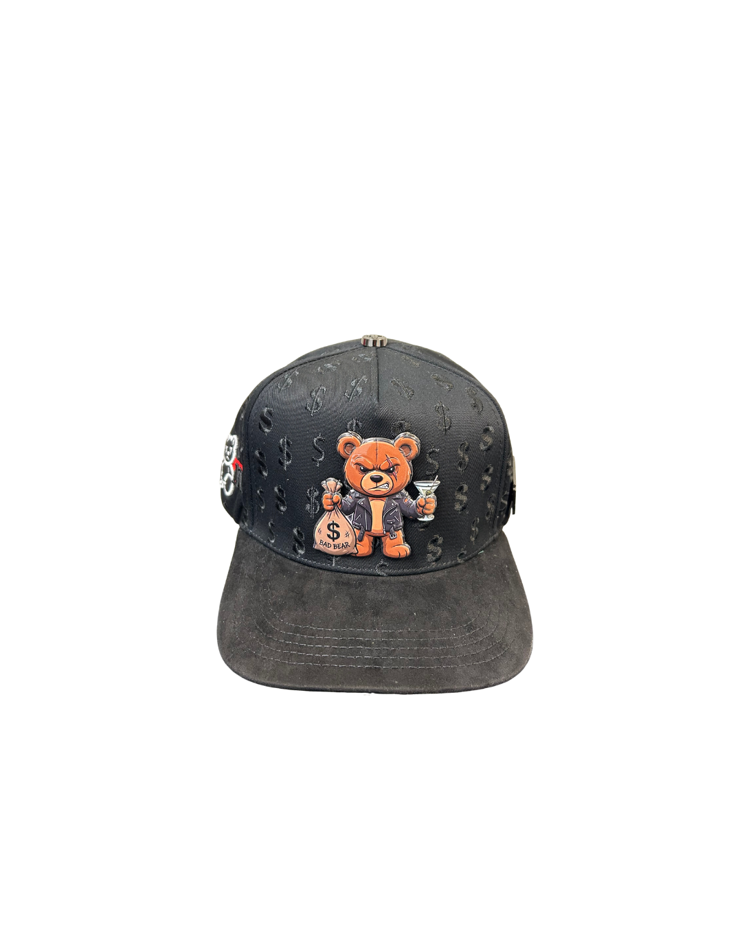 Black cap with a bear pin holding a martini glass and money bag, on a blurred indoor background.